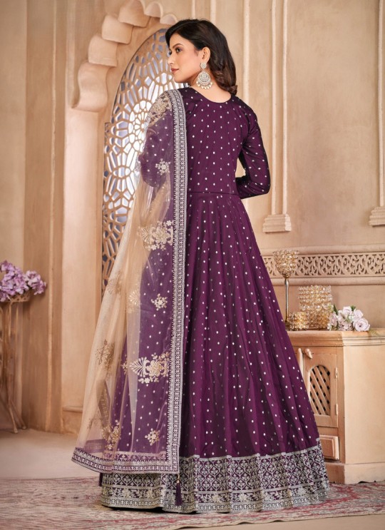 6602 Wine Tafeta Butti Silk Embroidered Semi-Stitched Anarkali Suit 6602 Wine Tafeta Butti Silk Embroidered Semi-Stitched Anarkali Suit