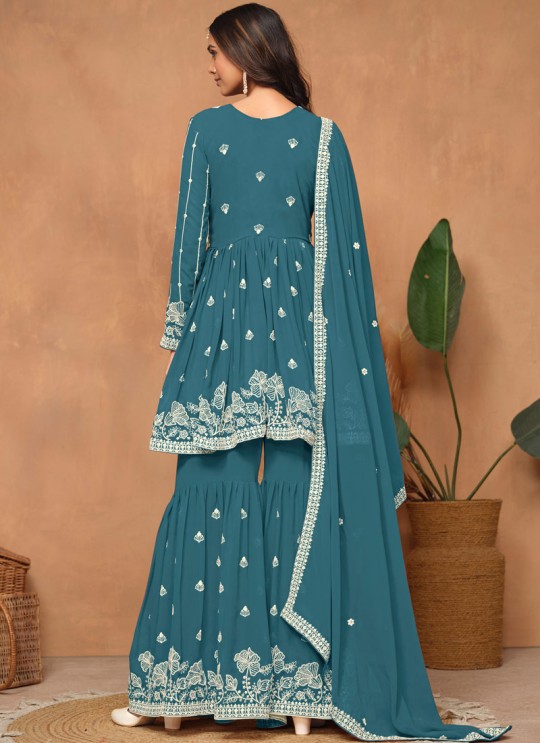 9403 Teal Blue Faux Georgette Embroidered Semi-Stitched Sharara Suit 9403 Teal Blue Faux Georgette Embroidered Semi-Stitched Sharara Suit