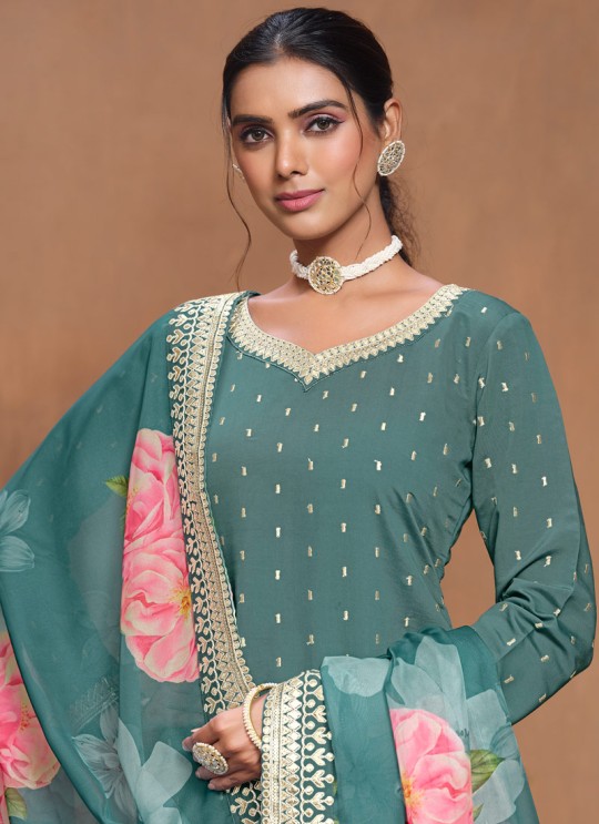 9702 Teal Blue Roman Silk Embroidered Semi-Stitched Sharara Suit 9702 Teal Blue Roman Silk Embroidered Semi-Stitched Sharara Suit