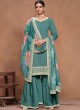 9702 Teal Blue Roman Silk Embroidered Semi-Stitched Sharara Suit 9702 Teal Blue Roman Silk Embroidered Semi-Stitched Sharara Suit