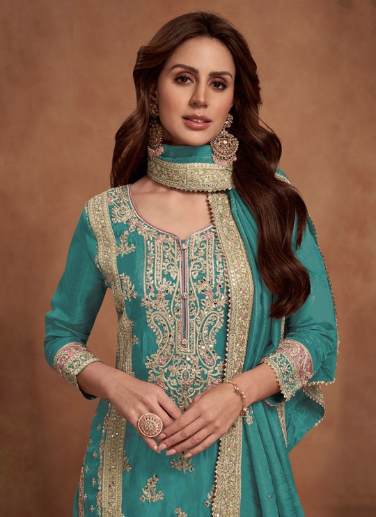 Teal Blue Silk Embroidered Semi-Stitched Palazzo Suit 1125D Teal Blue Silk Embroidered Semi-Stitched Palazzo Suit 1125D
